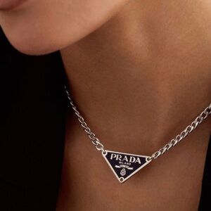 New Authentic silver with black Prada logo tag - necklace. (18in.ext. to 20in.)
